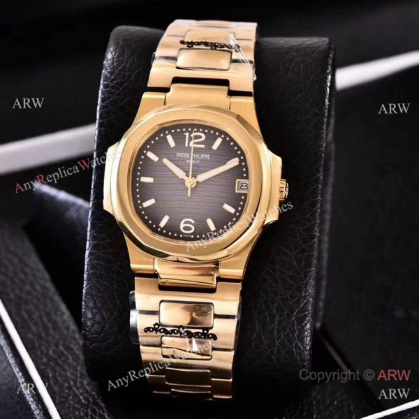 replica Copy Patek Philippe Nautilus Womens Yellow Gold and Blue Swiss Quality WATCHES 1