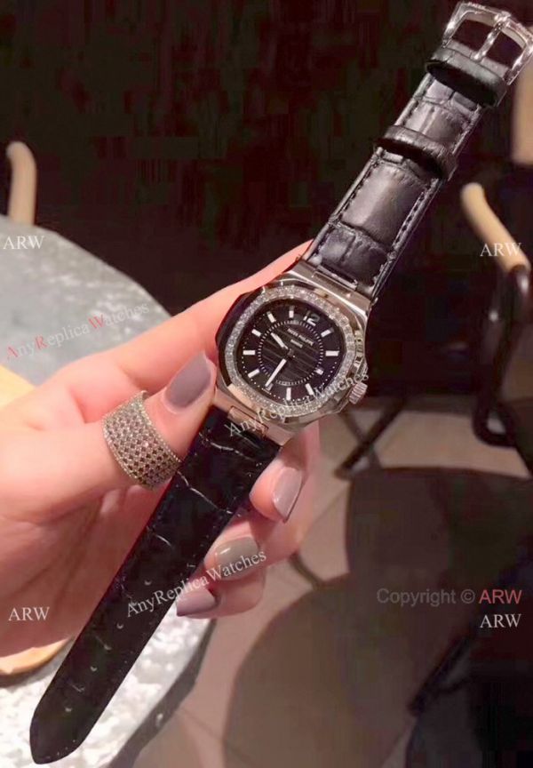 Copy Patek Philippe Nautilus Womens Diamond Bezel Orange WATCHES 2